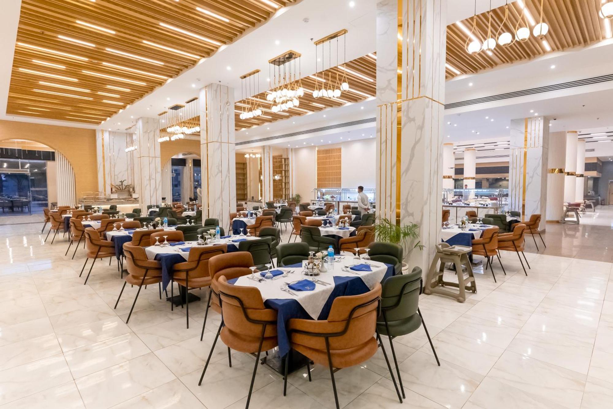 The V Luxury Resort Sahl Hasheesh 洪加達 外观 照片 The restaurant