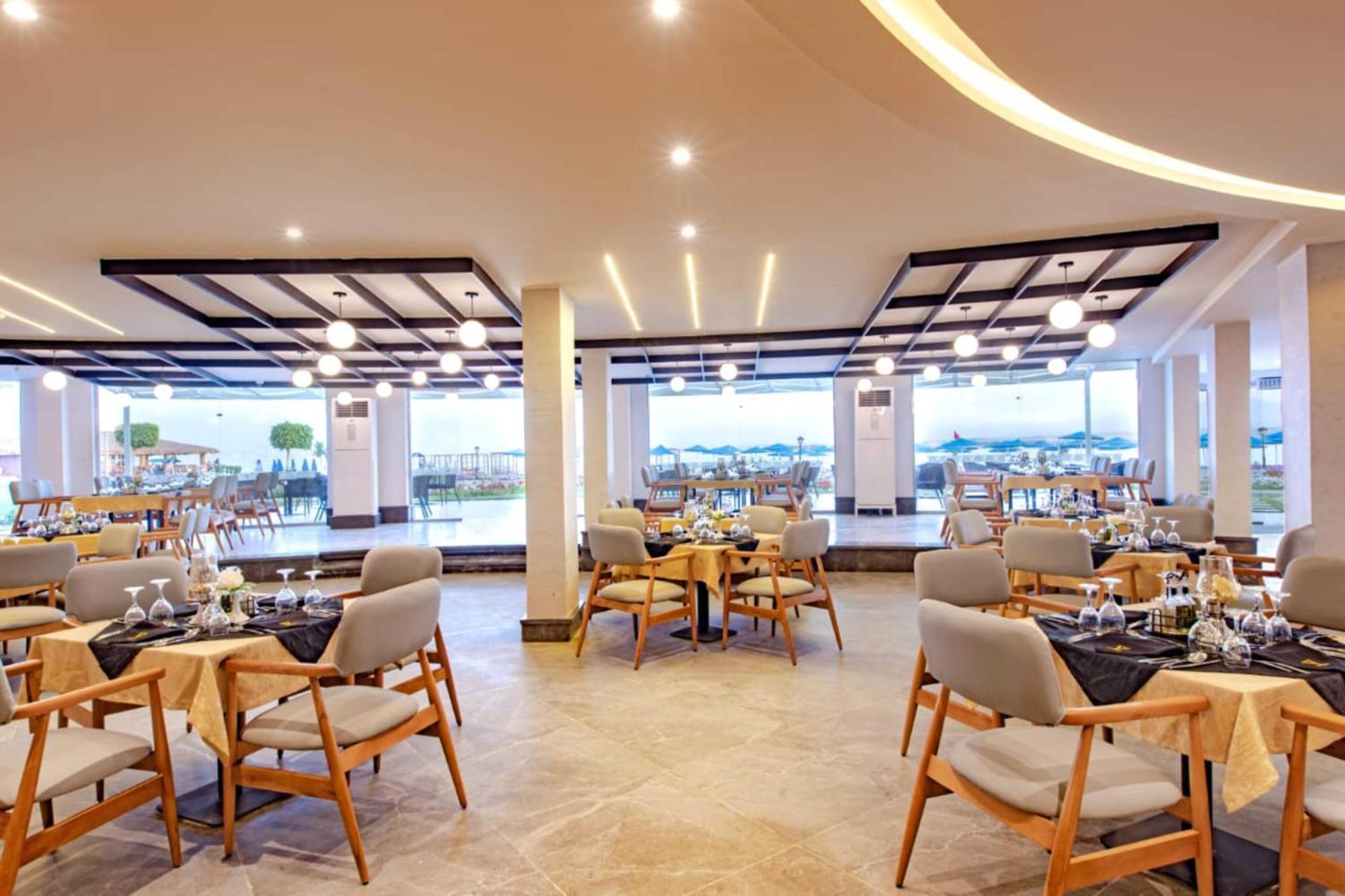 The V Luxury Resort Sahl Hasheesh 洪加達 外观 照片 Restaurant